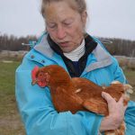 Janis holding one of our brood of chickens